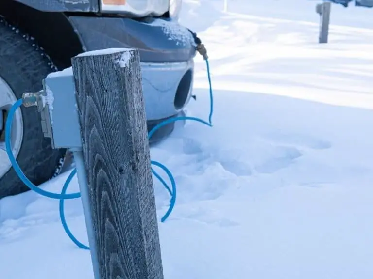 Block heater to a car in the snow