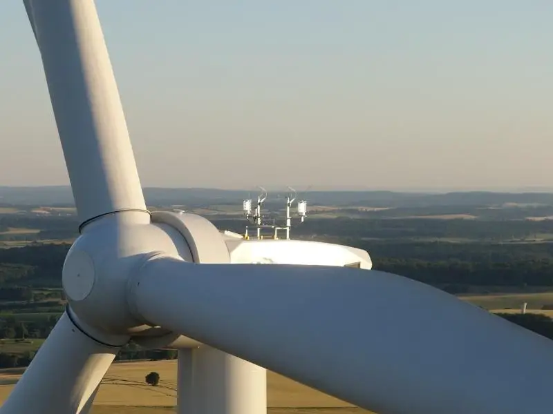 Close up of the top of a wind turbine