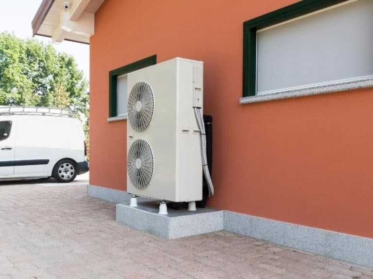 Heat pump fan outside of a house