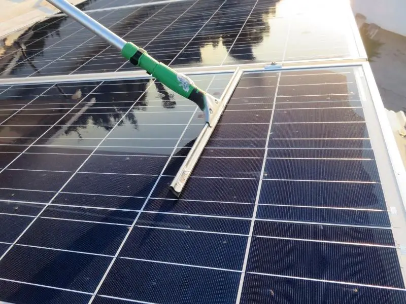 Solar panels being cleaned