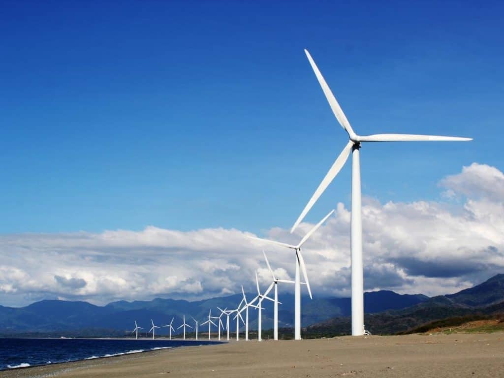 Wind tubines on a beach