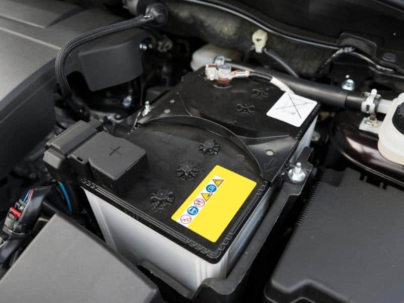 Car battery connected to cables