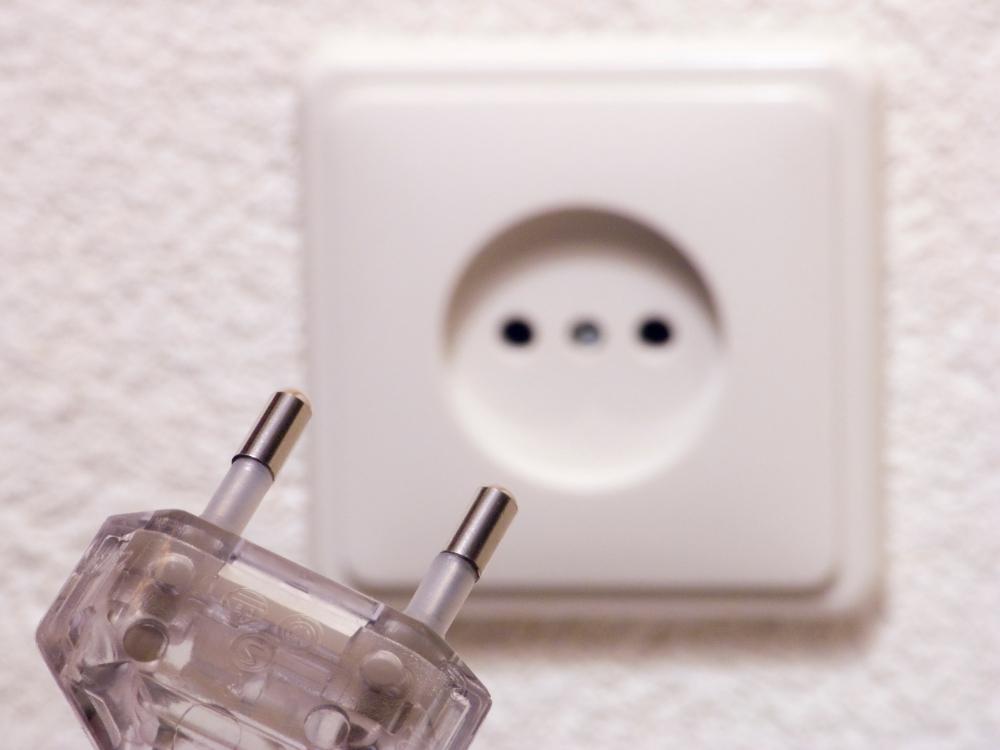 Why Do Electrical Plugs Have Holes? (You Should Know)