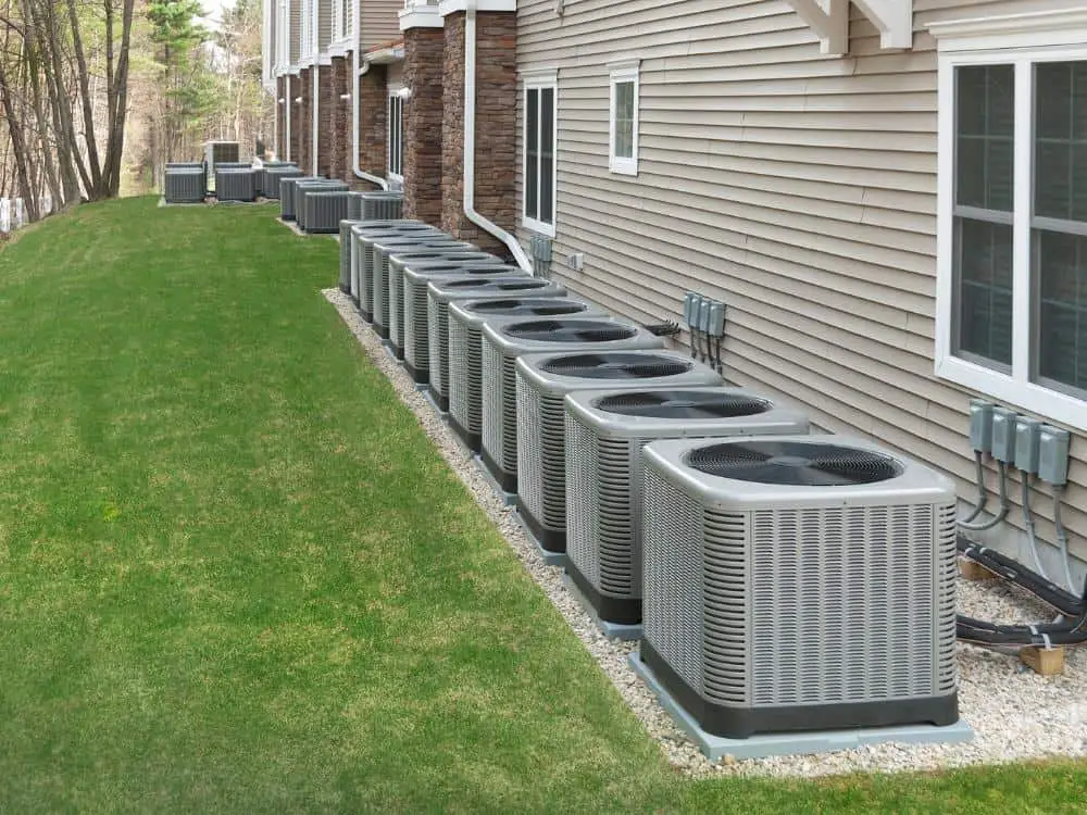 Heat pumps along a back yard