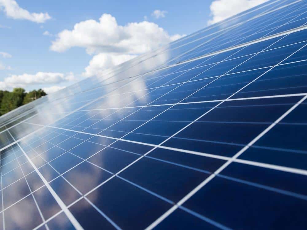 Solar panels reflecting clouds