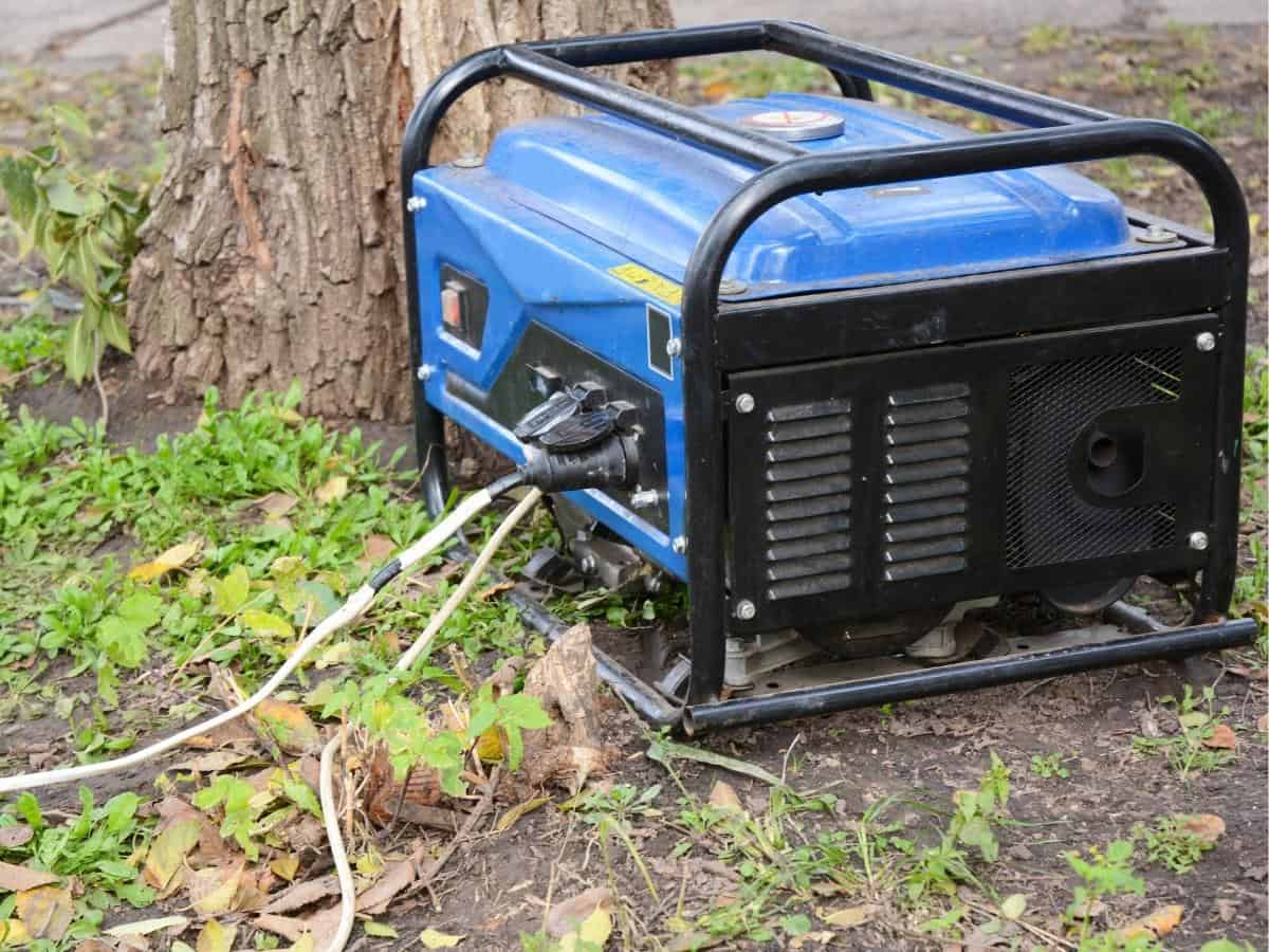 Generator outside next to a tree