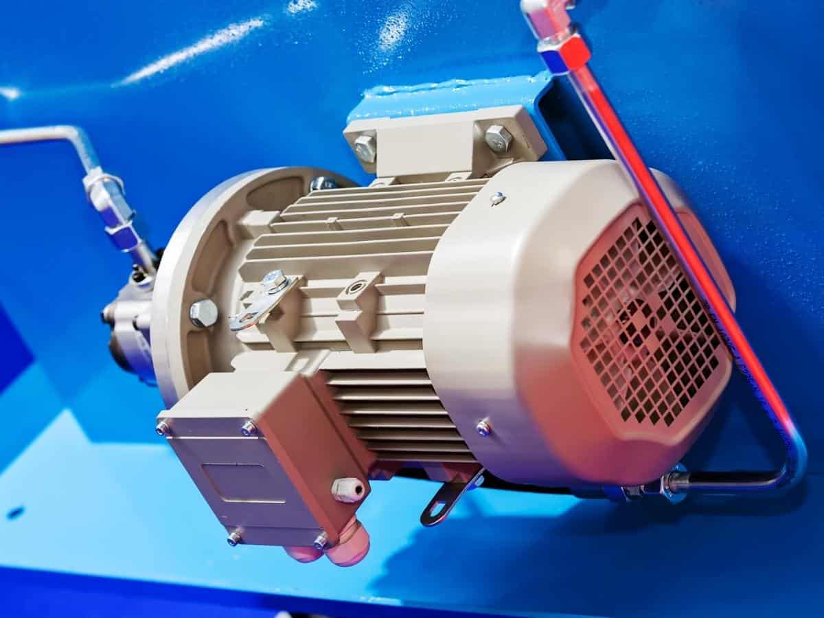 Large and powerful electric motor in modern industrial equipment plant.