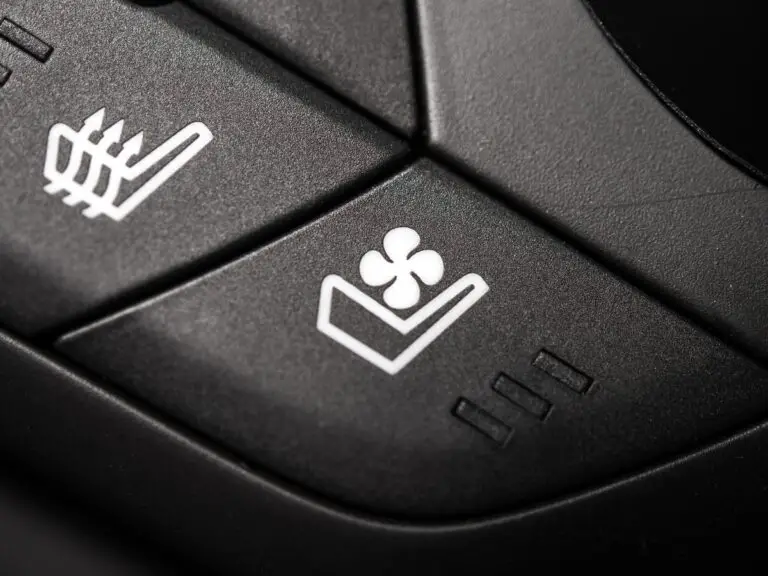Heated seats control button